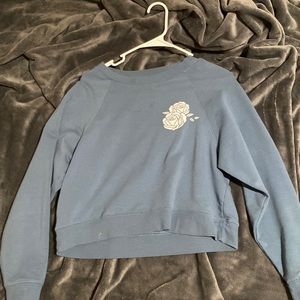 Cute dark blue/greenish sweater with print